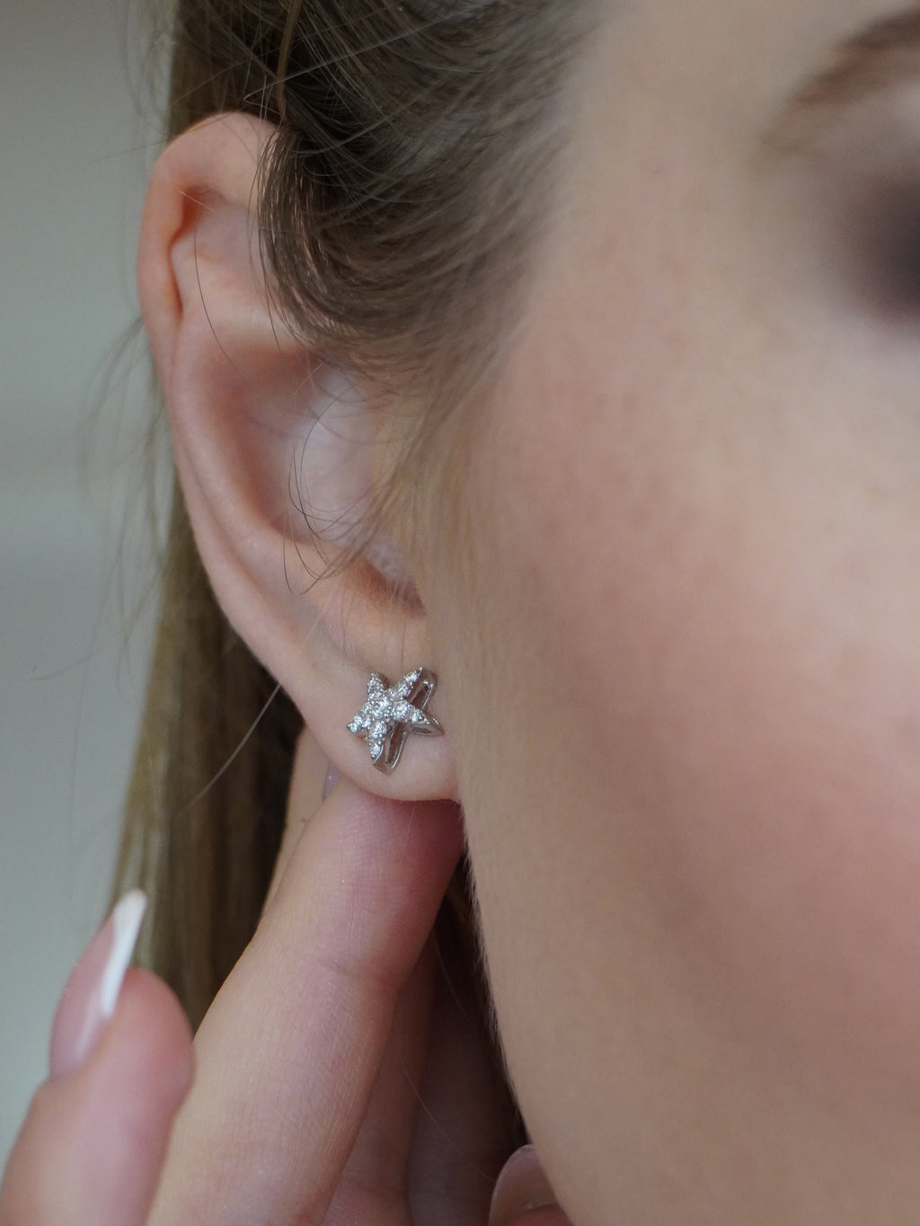 Orecchini con stelle di diamanti