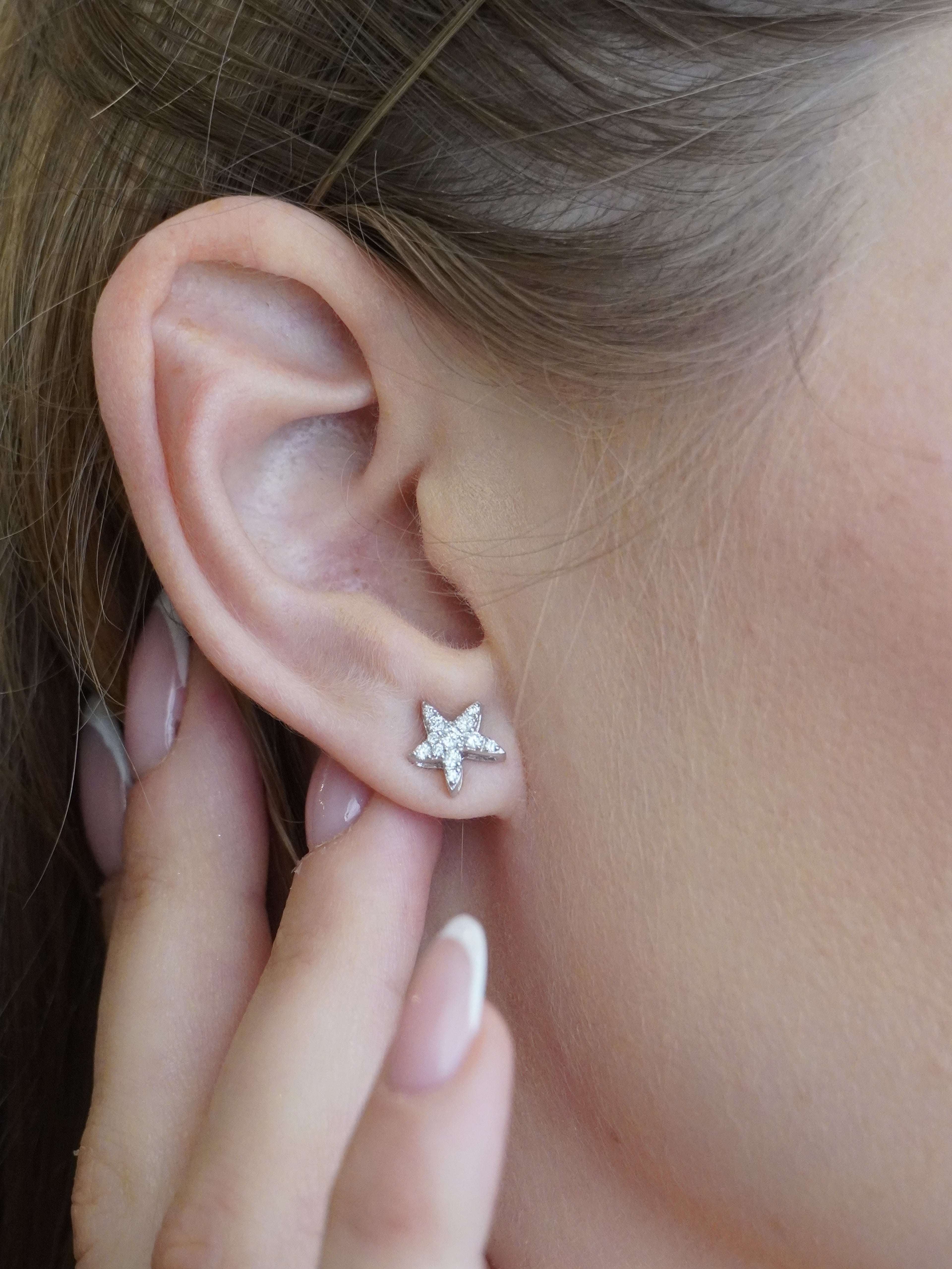 Orecchini con stelle di diamanti