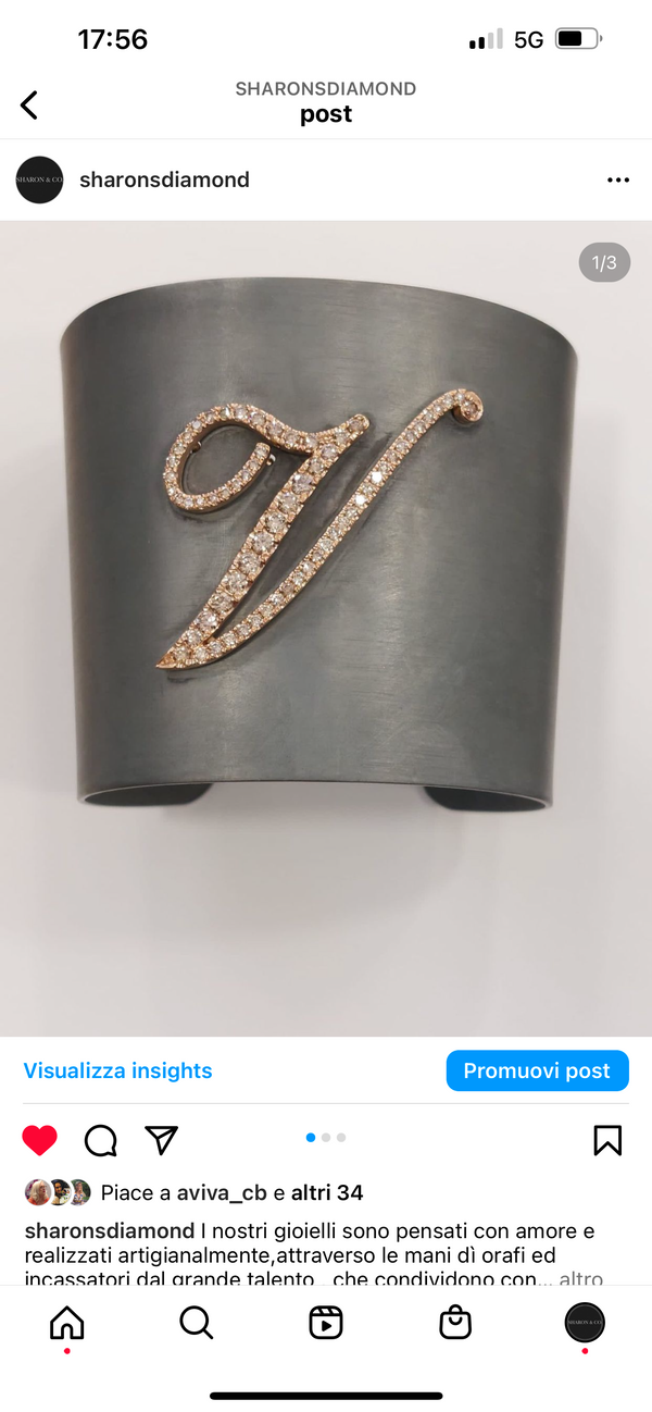 Bracciale con lettera in oro rosa e brillanti champagne